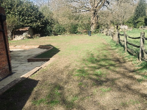 Completed Cobham garden with restored lawn, sandstone patio and pool
